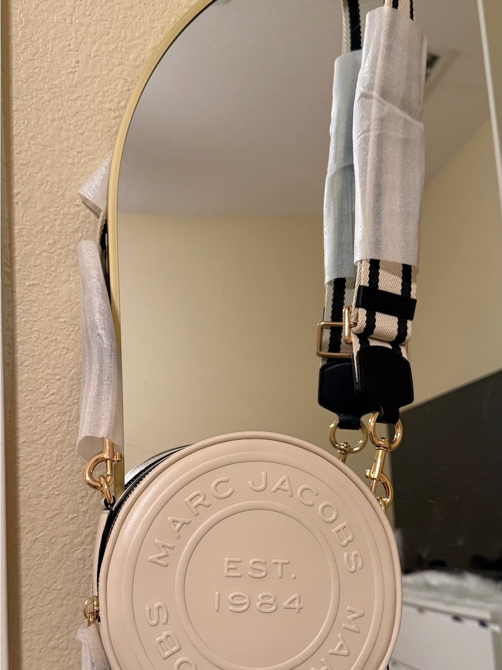 Michael Kors Cream Round Crossbody with Striped Strap